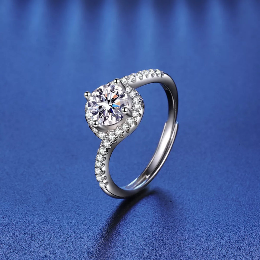 Sterling silver moissanite ring with round halo and pavé band, 1 carat