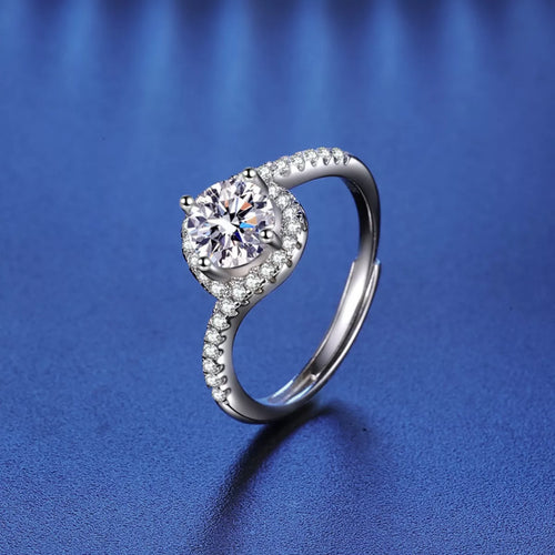 Sterling silver moissanite ring with round halo and pavé band, 1 carat