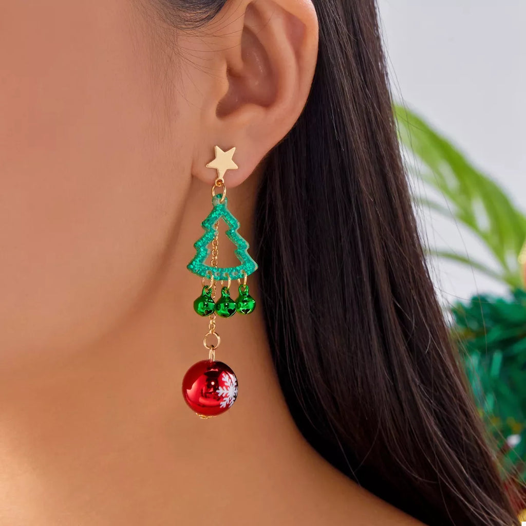 Single drop earring: gold star top, green tree with bells, red snowflake bauble