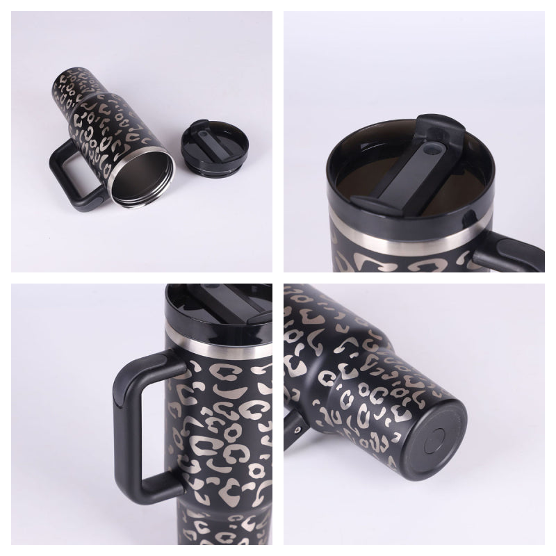 40 oz insulated tumbler with handle, clear straw, and black leopard-style pattern