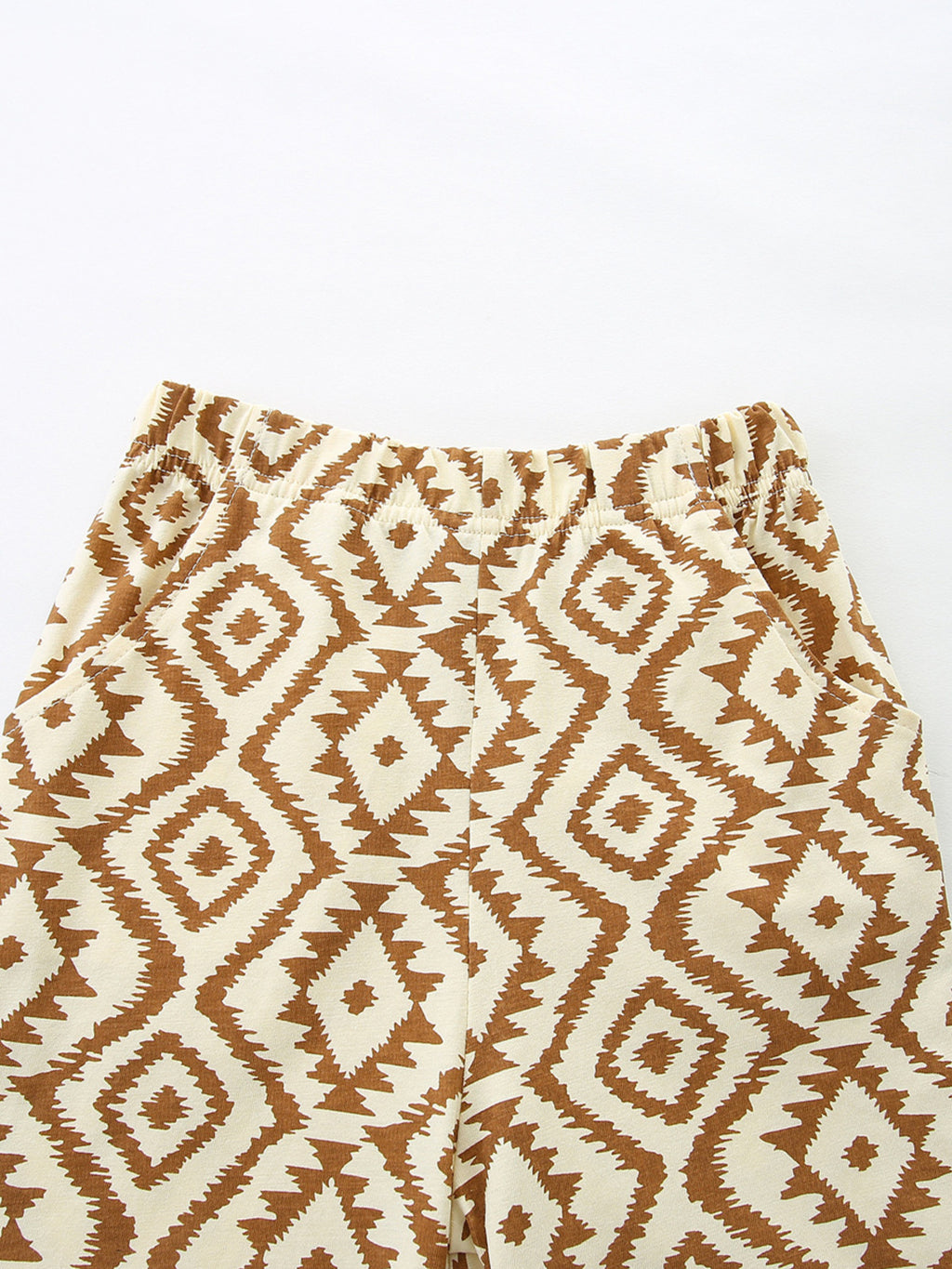 Geometric print shorts with elastic waistband, tan and brown diamond motifs