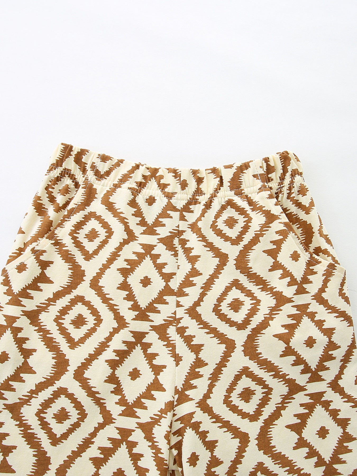 Geometric print shorts with elastic waistband, tan and brown diamond motifs