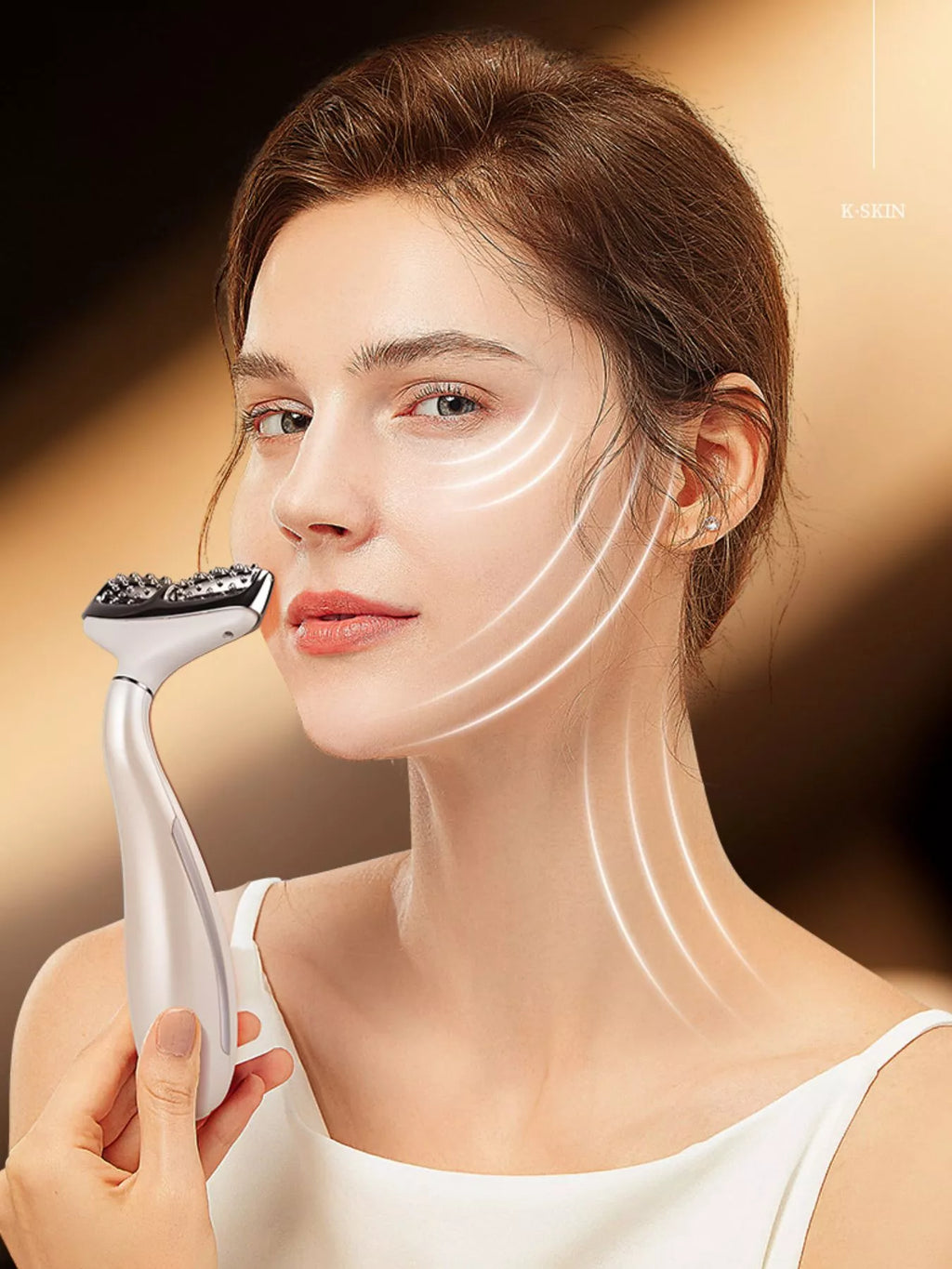 White facial massager device with textured roller head and red LED ring