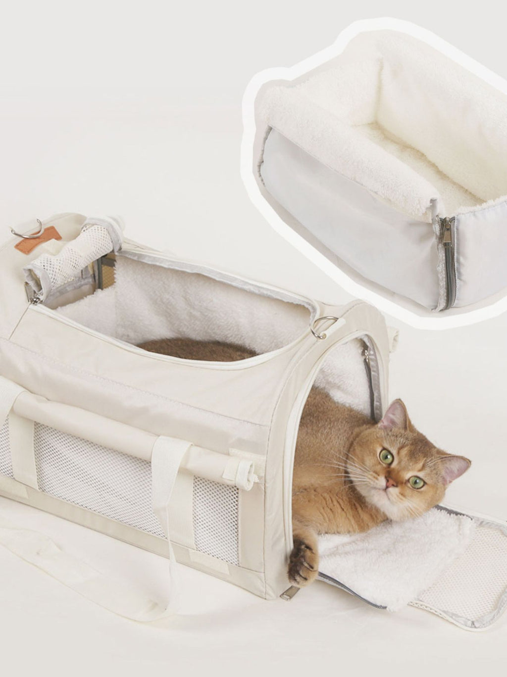 Pet carrier bag with removable liner insert, open top, plush-lined interior in white.