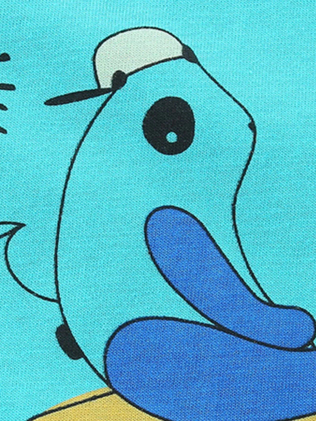 Close-up of blue animal illustration on aqua T-shirt