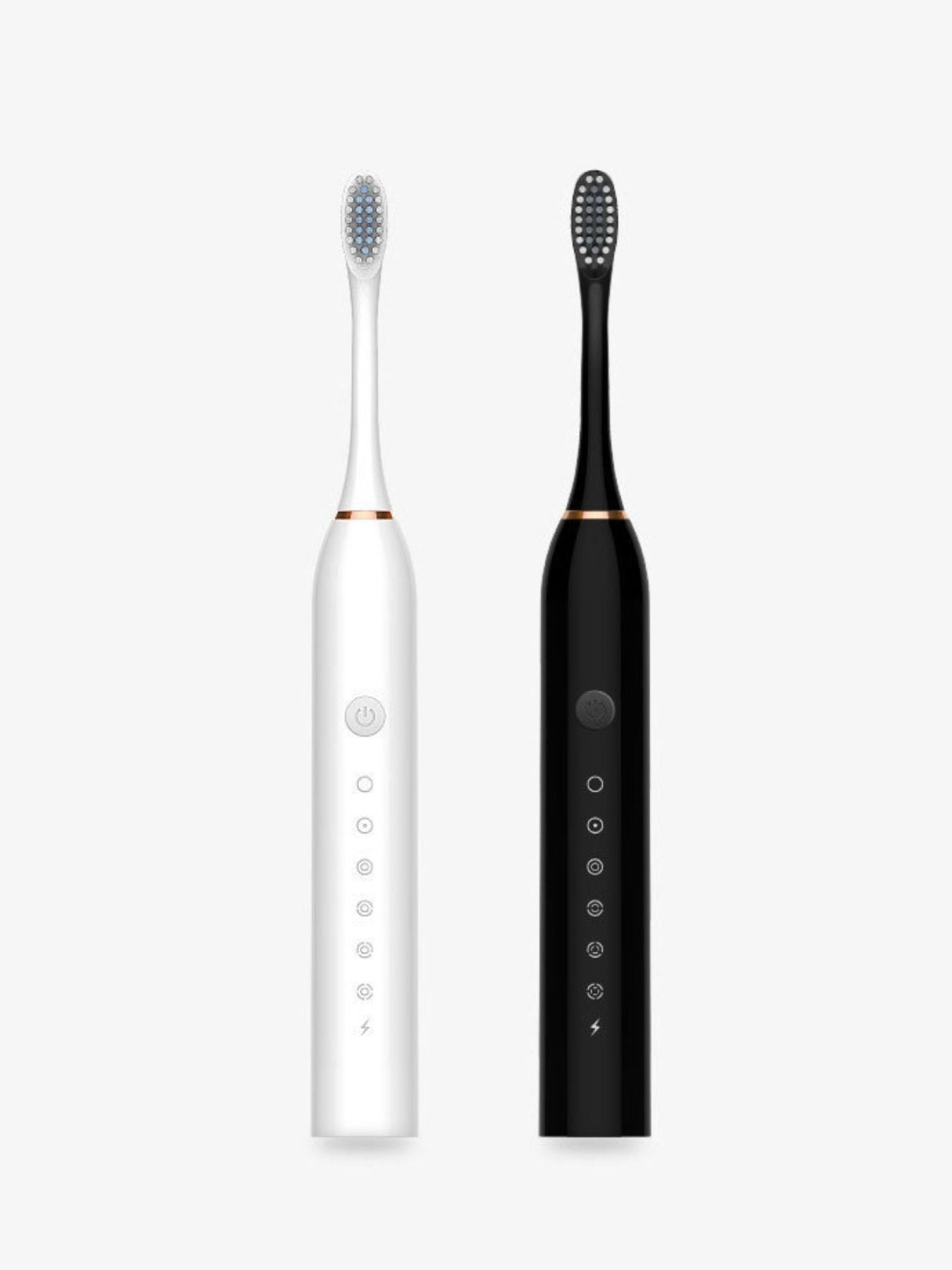 White and black electric toothbrush handles with mode buttons