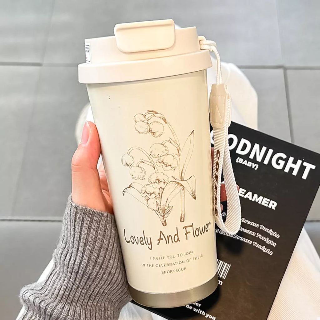 Lovely and Flower tumbler, cream color with straw lid and floral line art