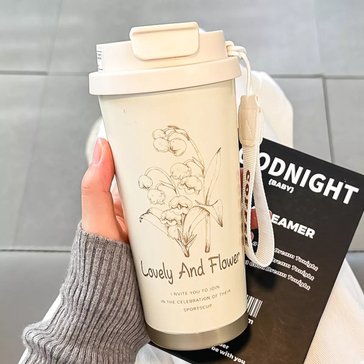 Lovely and Flower tumbler, cream color with straw lid and floral line art