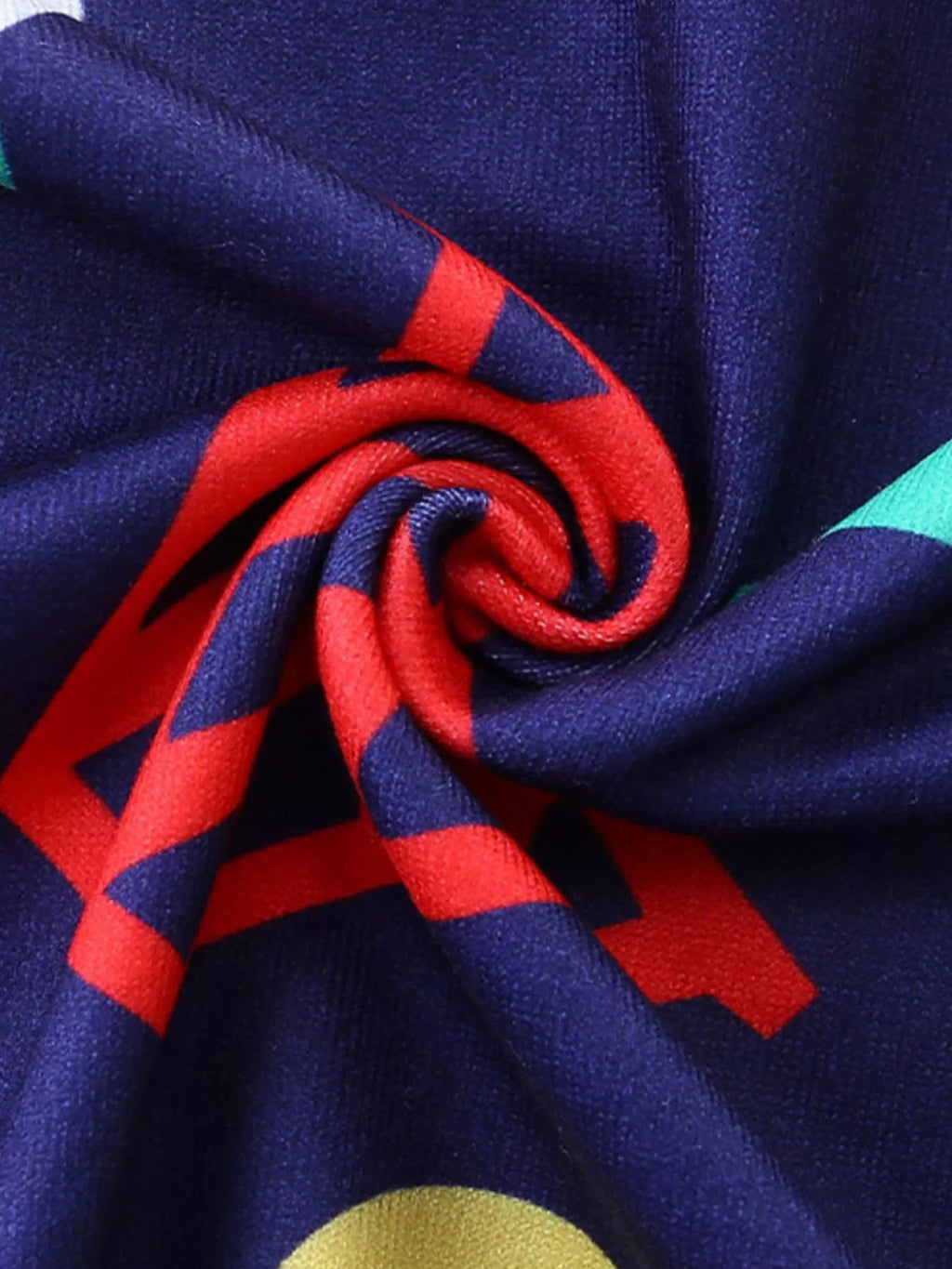 Navy fabric close-up with multicolor sports graphic print texture