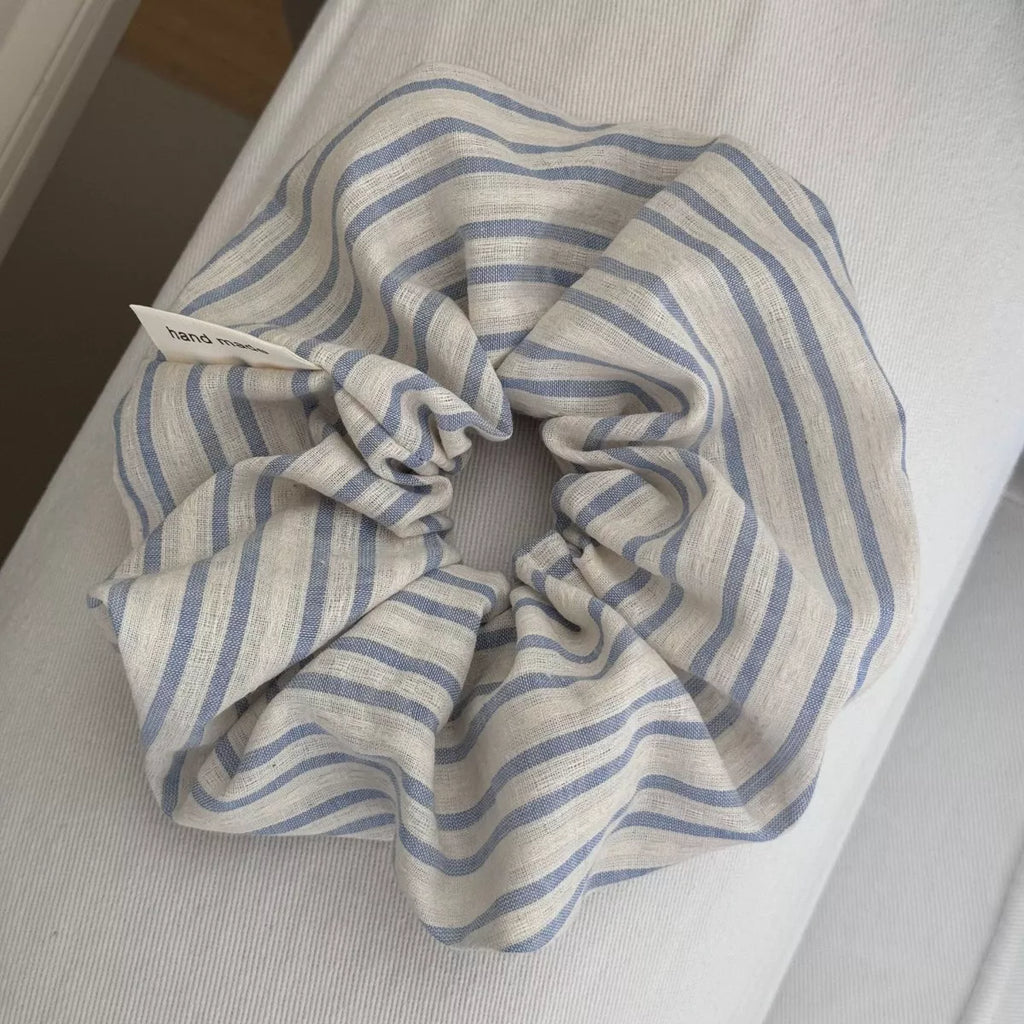 Light blue striped hair scrunchie, tied bow style