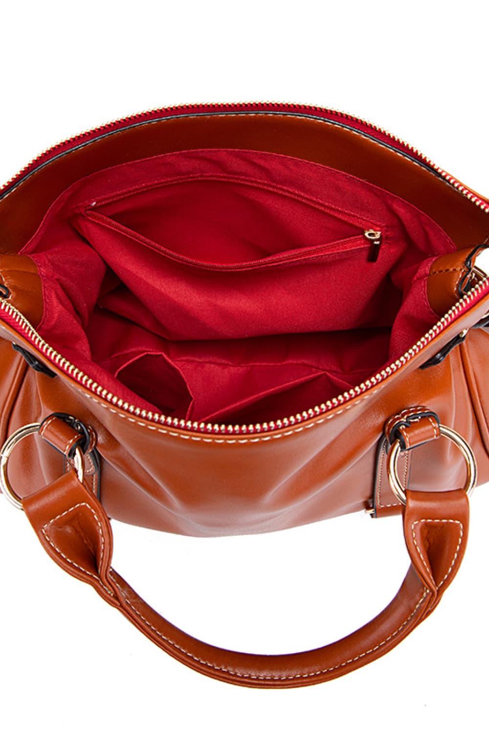 PU-Leder-Handtasche offen: rotes Innenfutter und Reißverschlusstasche