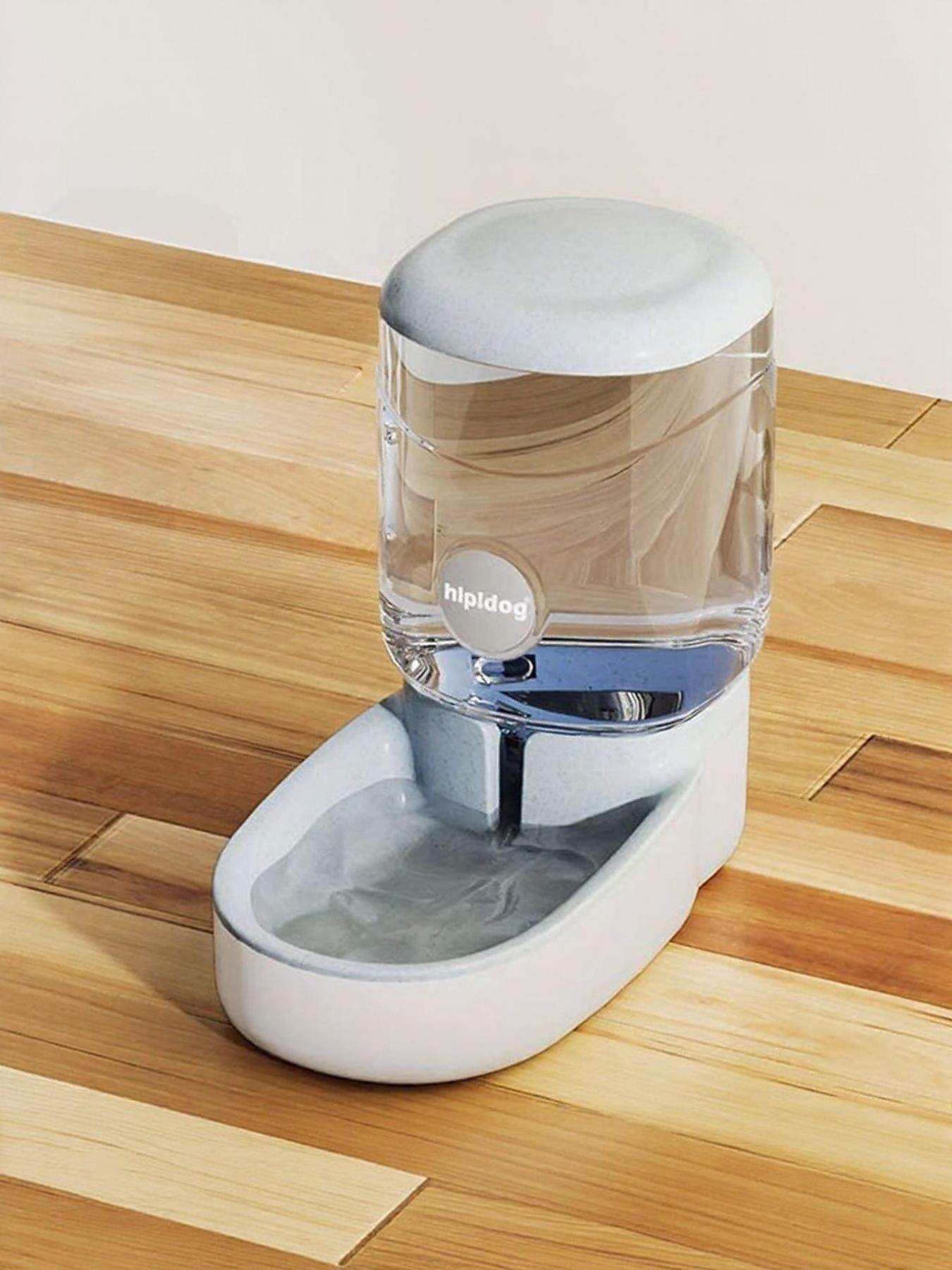 Light gray automatic water dispenser with clear tank, spout, and white reservoir base