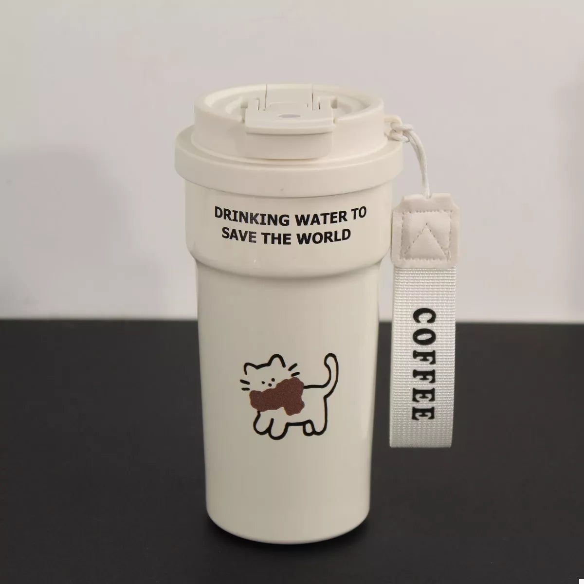 Cream stainless steel tumbler with straw, cat graphic, COFFEE strap, 'SAVE THE WORLD'