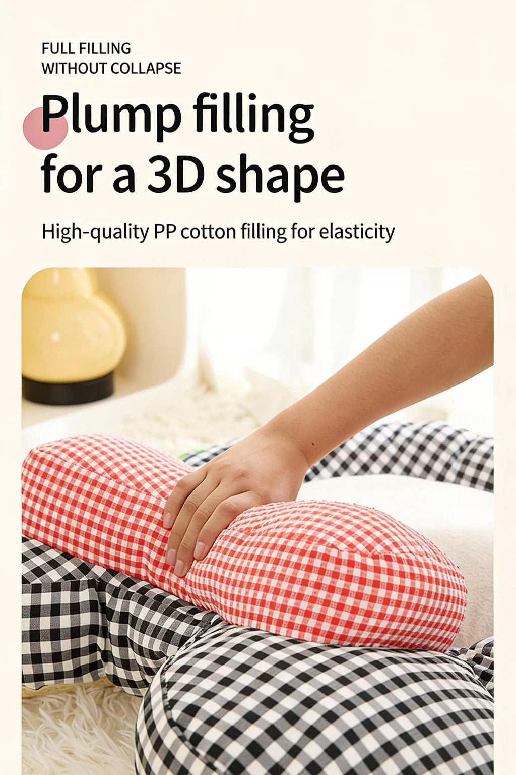 Plush plaid pet mat with red check bow, hand pressing to hold shape