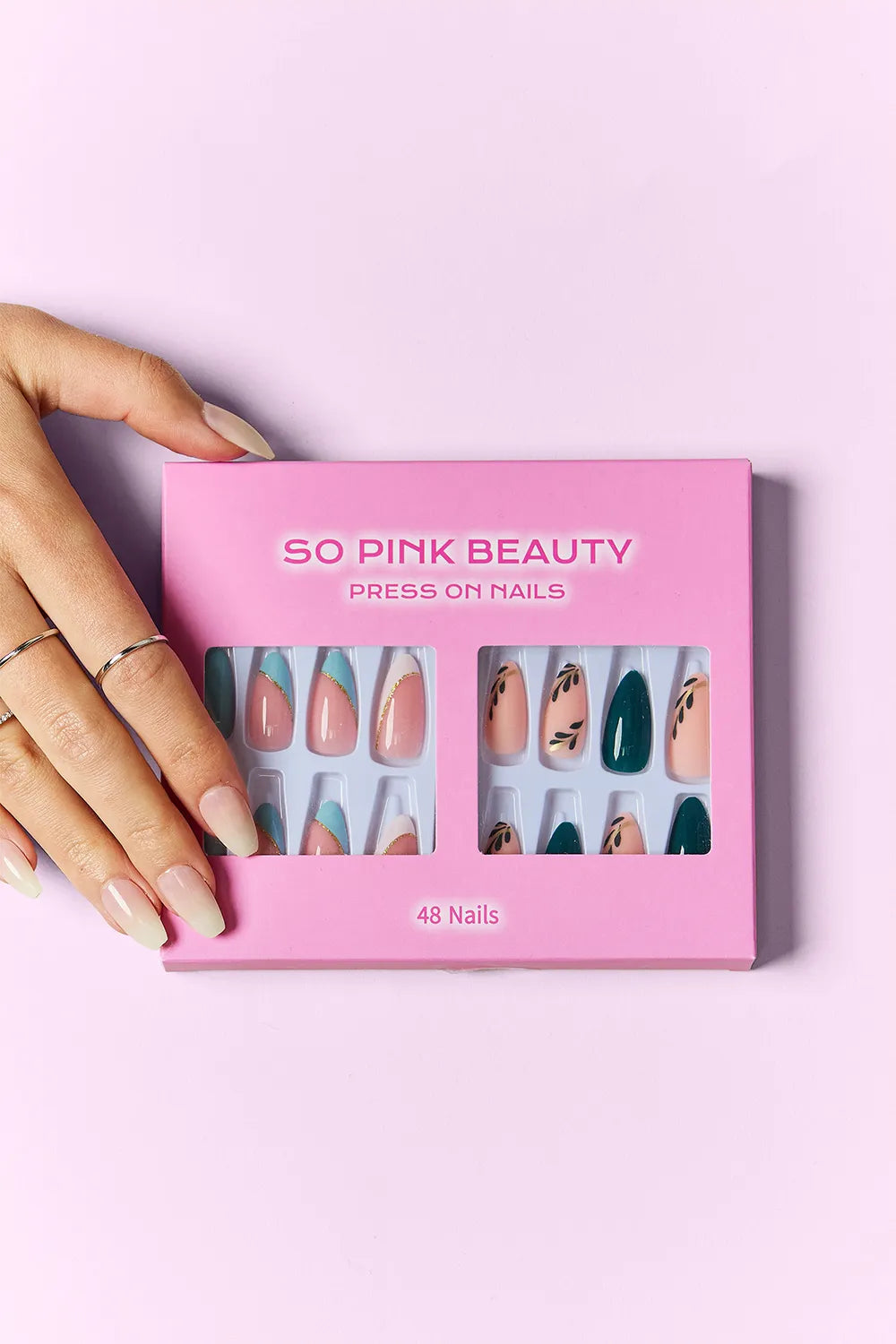 SO PINK BEAUTY press-on nails box, 48 nails, pastel blue, nude, and green mix