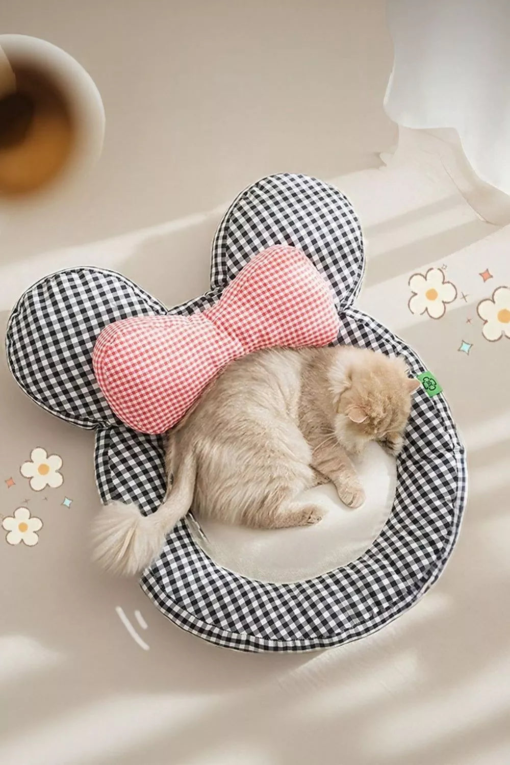 Plaid pet mat with oversized bow, red gingham and black check heart bed