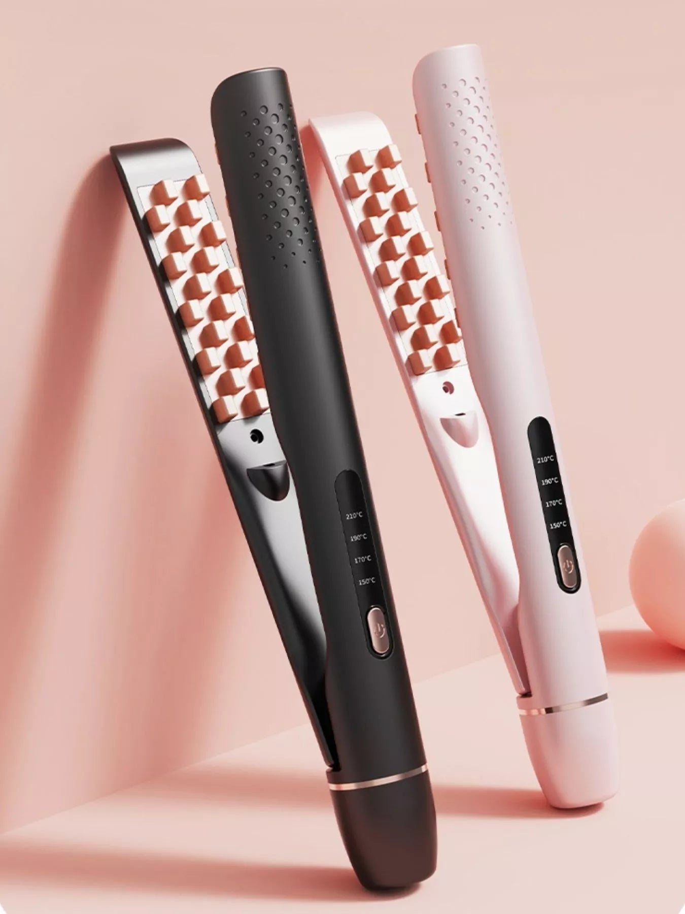 Hair straighteners in Black and Blush Pink, both open with heated plates visible