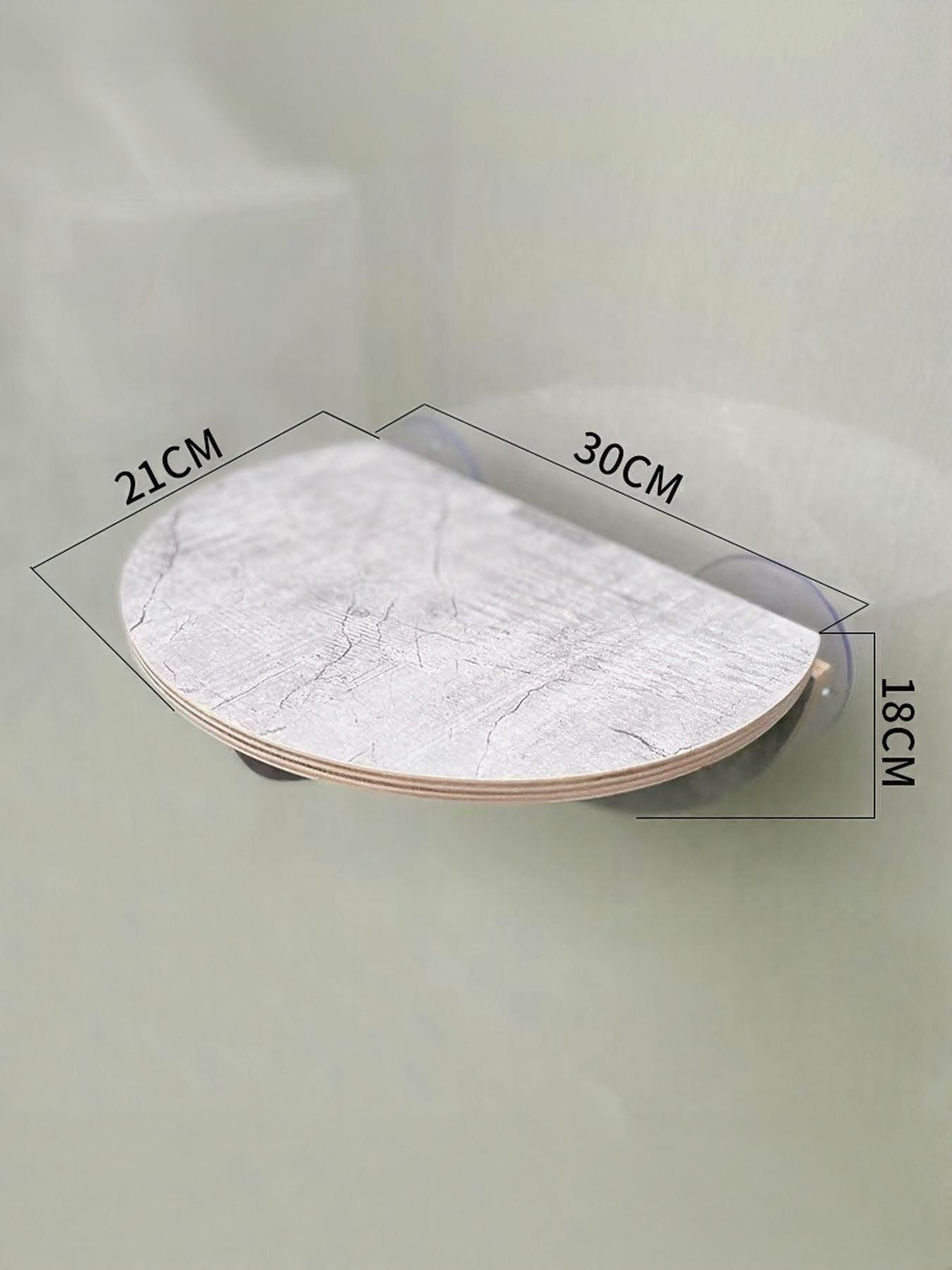Window-mounted oval cat cushion bed with light fabric and size measurements, 30cm by 21cm