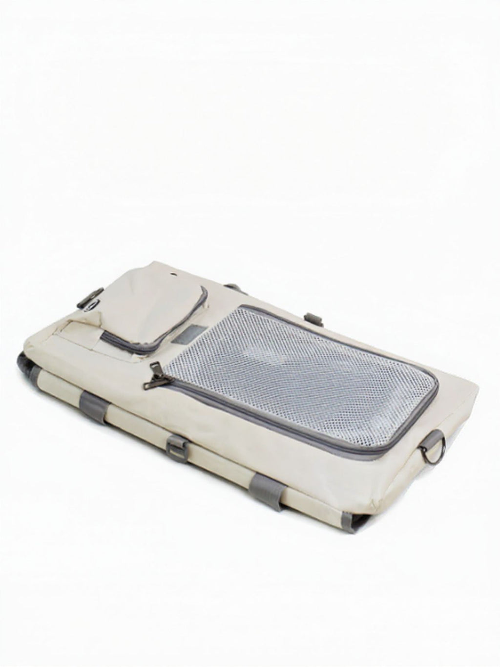 Gray breathable pet carrier bag folded flat, with mesh top insert and zipper closures.