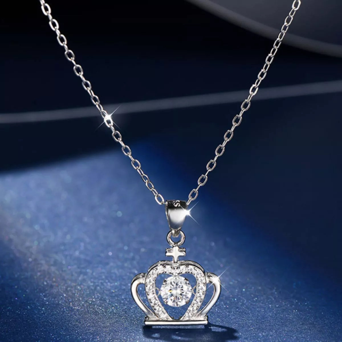 Silver crown zircon pendant with heart-shaped setting on chain