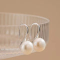 Silver pearl drop earrings with curved hooks, twin round white pearls