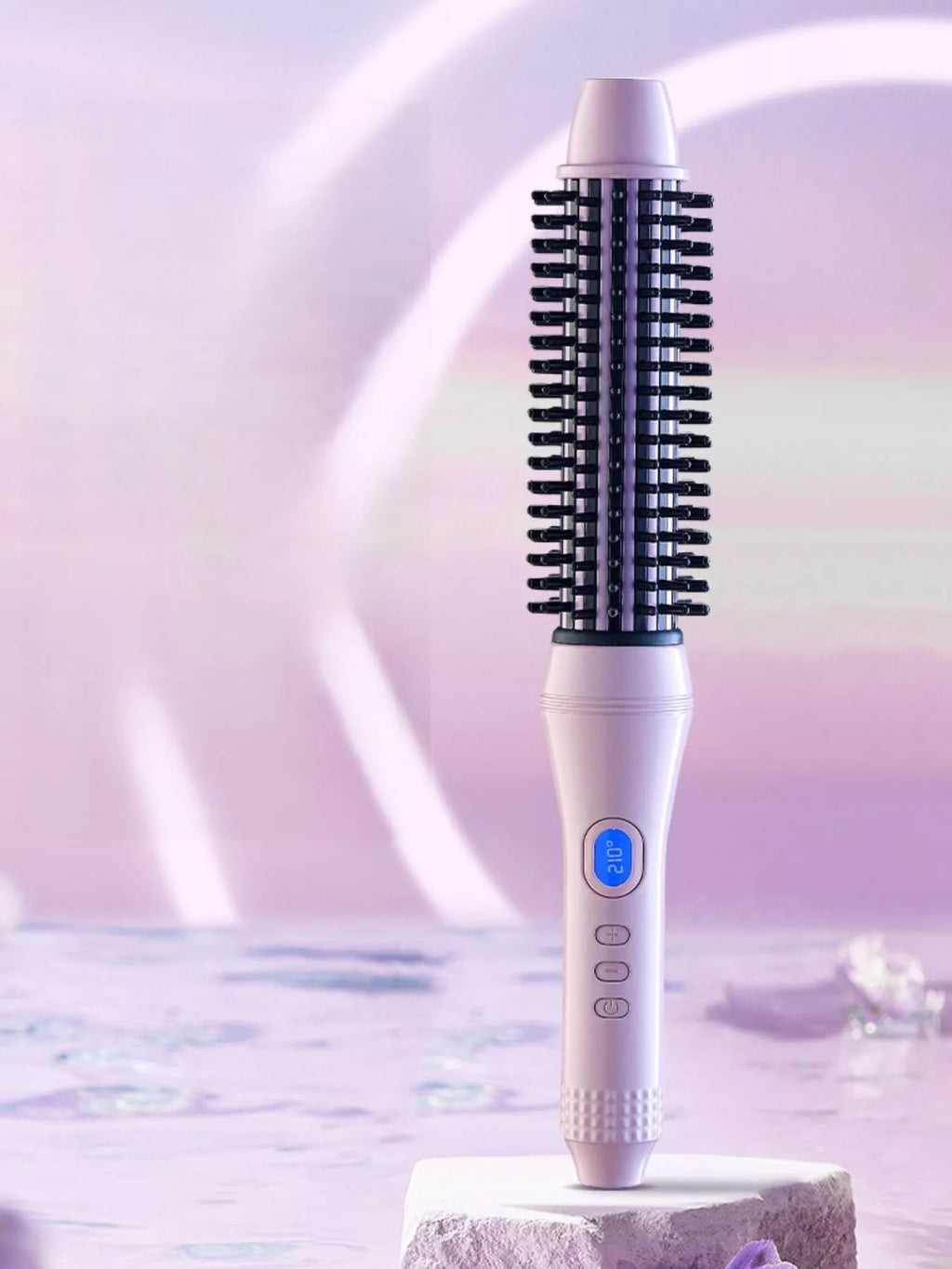 Pink-purple hot air brush standing upright with black bristle barrel and buttoned handle