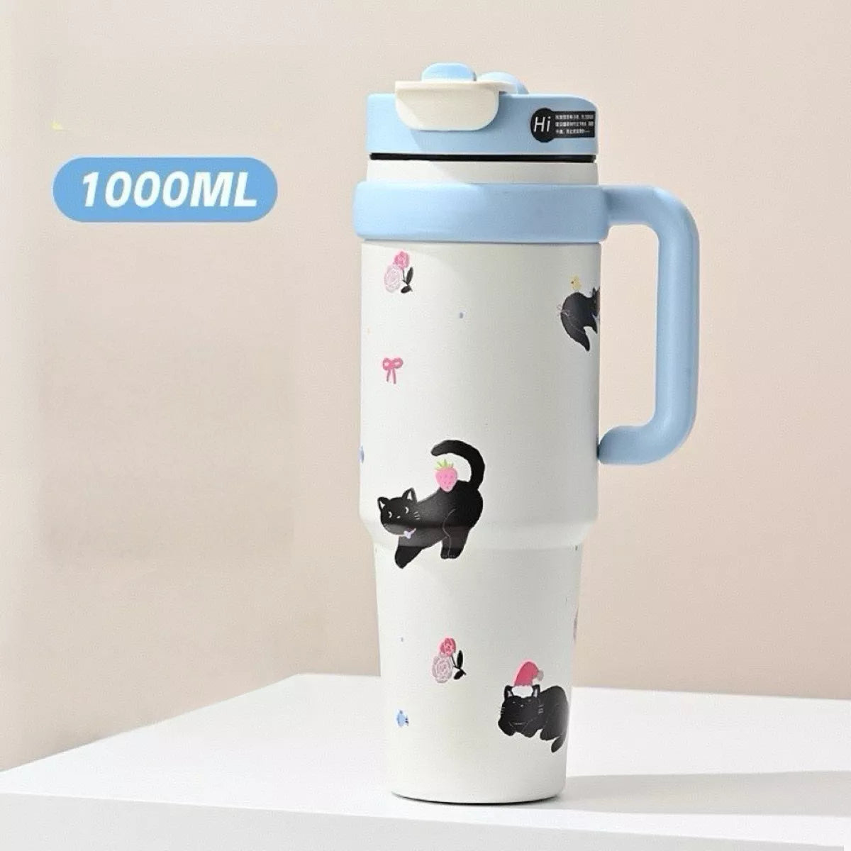 Light blue 1000ML water bottle with straw, cat print, flip-top lid