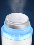 White beauty device with chrome cap, top droplets, and blue outer ring