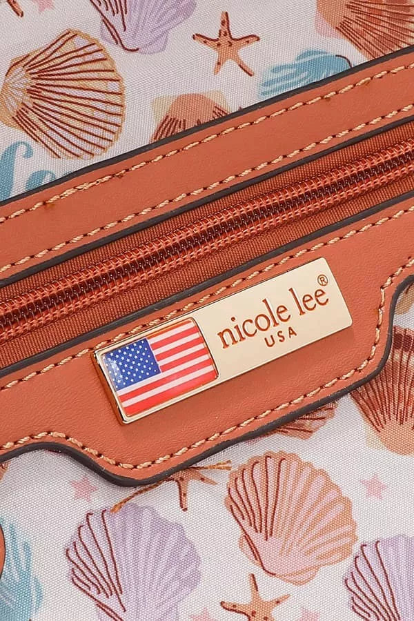 Sun-and-sand wallet close-up: US flag badge, zipper, and decorative stitching
