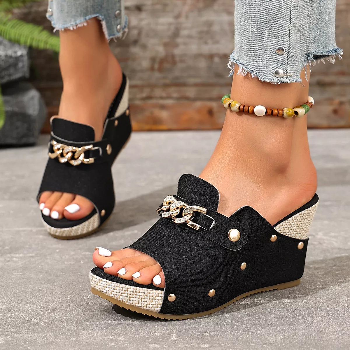 Open Toe Wedge Sandals in black with open toe, stud details, and metal chain strap hardware