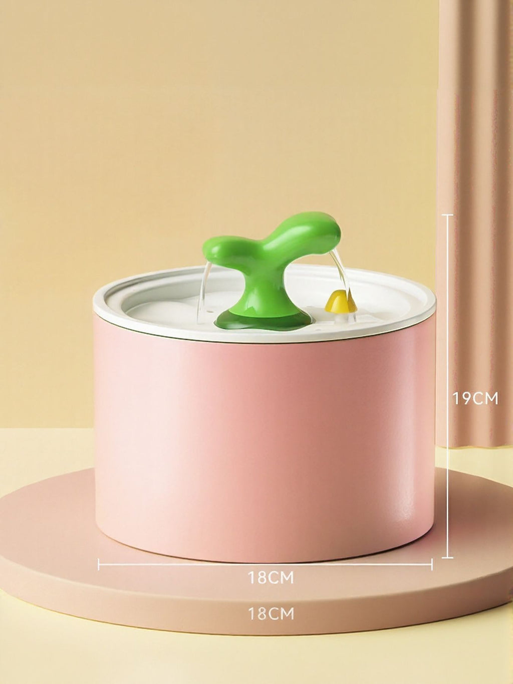 Watermelon pink automatic drinking fountain with green spout and yellow outlet